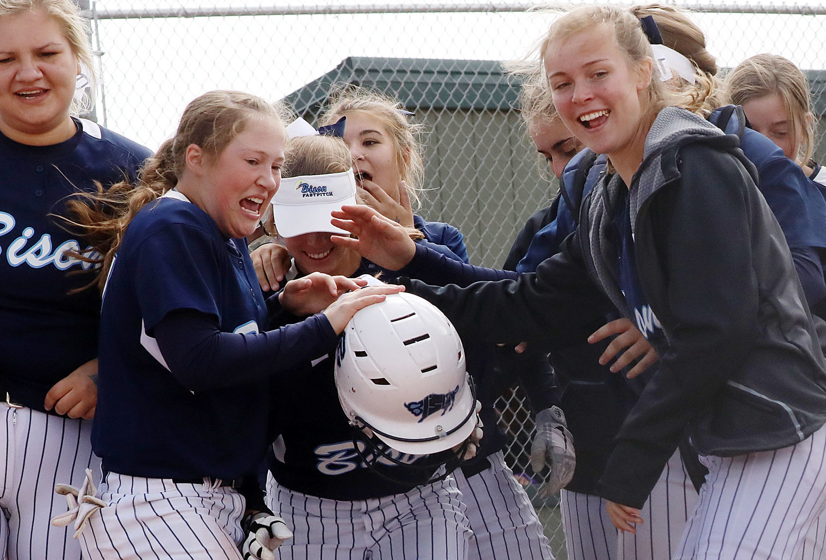 The Bison celebrate a home run